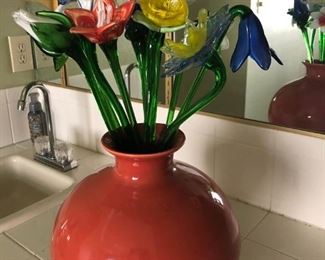 Burnt orange vase with glass flowers