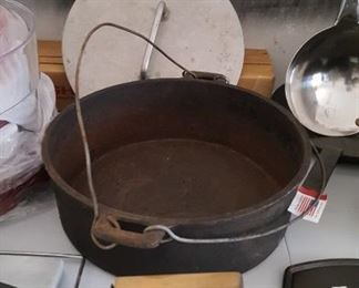 Large cast iron pot, meat press