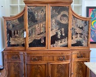 Antique China Cabinet completely enclosed. 73"W x 84"H x 16.5 D, Hand Carved and hand painted chinoiserie influences. Burled wood and brass pulls