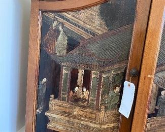 Antique China Cabinet completely enclosed. 73"W x 84"H x 16.5 D, Hand Carved and hand painted chinoiserie influences. Burled wood and brass pulls