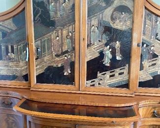 Antique China Cabinet completely enclosed. 73"W x 84"H x 16.5 D, Hand Carved and hand painted chinoiserie influences. Burled wood and brass pulls