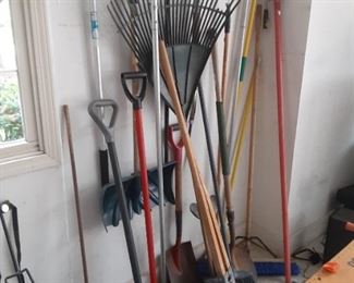 Miscellaneous garden tools rakes shovels excetera