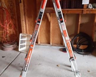 Little Giant 19 ft adjustable ladder. Has leg leveler, paint work platform, project tray and wall standoff $360