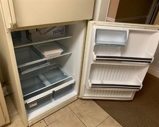 #14	GE 21 cu freezer on top frig with ice maker  almond color 30x29x65	 $125.00 
