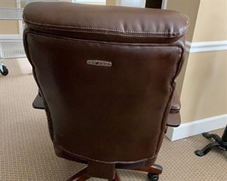 #24	lazyboy brown bonded leather type wood arm executive chair 	 $150.00 
