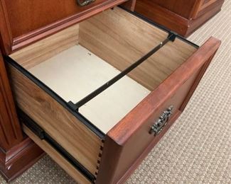 #29	inlay burl wood desk with file drawer, 3 drawers, 2 pull out writing desk cpu cabinet (door needs screws, Hutch with 2 drawers, 2 doors with shelf, open glass shelf in middle, it has a decortive side design and carved wood collums  65x25x30-76	 $375.00 
