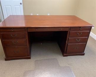 #34	Meridian home office collection Riverside Furniture wood with wood drawers desk with 9 drawers 2pull out writing board decortive side and back 	 $350.00 

