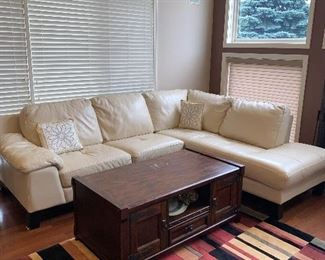 $800 CREAM / BEIGE LEATHER SECTIONAL 
LEFT SIDE
67”L x 37”D x 32”H
RIGHT SIDE
86”L x 38”W x 32”H
TOTAL LENGTH 105”
