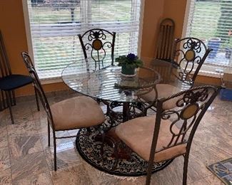 $350 ROUND GLASS / WOOD AND METAL KITCHEN TABLE WITH 4 CHAIRS 
48” DIA x 30.5”H
