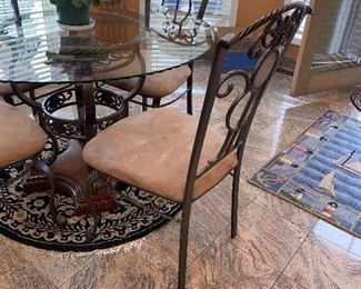 $350 ROUND GLASS / WOOD AND METAL KITCHEN TABLE WITH 4 CHAIRS 
48” DIA x 30.5”H

