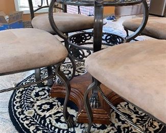 $350 ROUND GLASS / WOOD AND METAL KITCHEN TABLE WITH 4 CHAIRS 
48” DIA x 30.5”H
