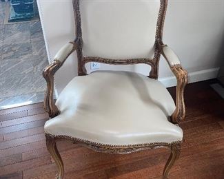 $250 ITALIAN LEATHER AND CARVED WOOD ARMCHAIR 
27”L x 21”D x 40.5”H