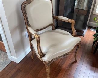 $250 ITALIAN LEATHER AND CARVED WOOD ARMCHAIR 
27”L x 21”D x 40.5”H