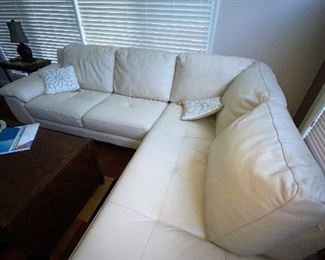 $800 CREAM / BEIGE LEATHER SECTIONAL 
LEFT SIDE
67”L x 37”D x 32”H
RIGHT SIDE
86”L x 38”W x 32”H
TOTAL LENGTH 105”
