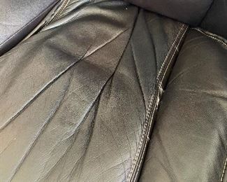 $50 BLACK FAUX LEATHER CHAIR WITH OTTOMAN - SOLD AS IS / PEELING 