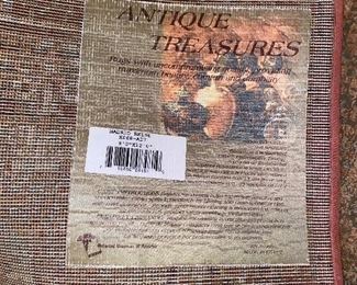 $100 OBLONG RUG BY AUTUMN TREASURES
9’ x 12’