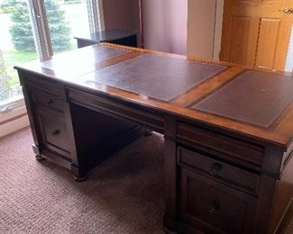 $1,200 SOLID WOOD DOVE TAILED EXECUTIVE DESK FROM MCLAUGHLIN'S FURNITURE NOVI
72.5”W x 36”D x 30.5”H
MSRP $2,500
