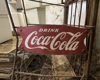 Fish tail Coca Cola Sign On Rusted Drink Cart 