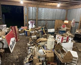 Vintage antiques piled in barn! Still digging and cleaning up signs and old treasures. 