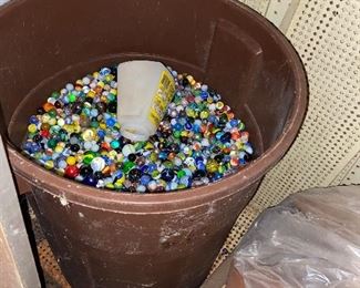 barrels full of old vintage marbles