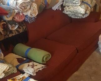 Hideabed couch with newer mattress,asst. linens