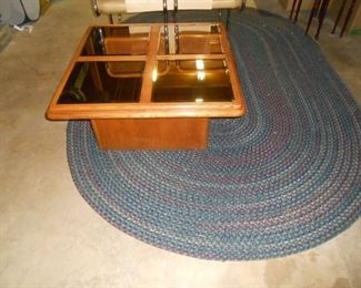 Large oval braided rug, 9' x 6'