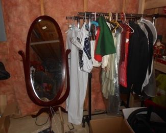 Nice freestanding oval mirror and clothing racks