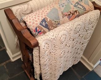 Quilt Rack with Quilts and Crocheted Items