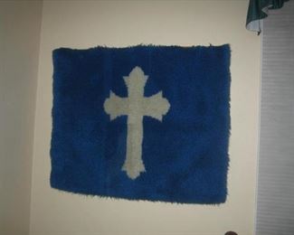 Handmade hook rug with cross symbol