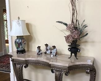 Large Console w/ marble top &  Metal cross legs 68” x 20”.   Arrangement sold
