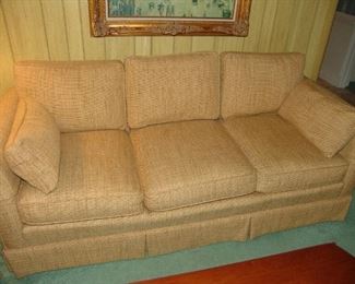 Three cushion upholstered sofa in good condition'