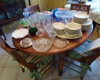Set of Poppy Trail china, Fostoria cake stand, and stemware