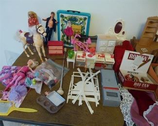 Barbie and Ken dolls and accessories, Barbie's horse, and doll furniture