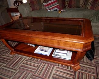 Great contemporary  coffee table with "beveled glass top"...50"x30"  Call Now...come and purchase..$100...also has matching end table!   (760) 445-8571  CJ....there is that cool SHAW geometric rug again...$75