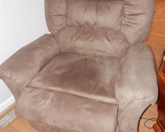 COCOA color.Ultra Suede rocking, swiveling recliner...the seat IS NOT dirty, the darker area is a photo anomaly from using the flash!  $165.00 Call Now, make appointment to come and purchase..(760) 445-8571