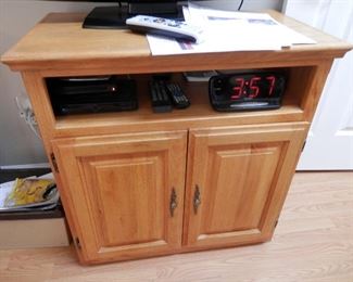 ****$30****TV stand/cabinet  with cubby hole for receiver and under storage....$30.........Make appointment by phone to come and purchase.  (760) 445-8571
