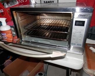 ****$75****Extra Large "OSTER" countertop convection oven...saves lots of time and money....easy to cook outside with when we have a heatwave !  Charlotte...(760)445-8571