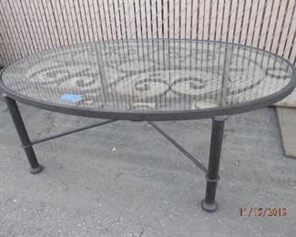 ****$175***NOW $100****  Side shot of Custom Fabricated wrought iron glass top coffee table.   Charlotte, (760) 445-8571    