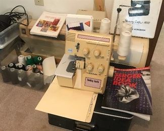 Janome sewing machine, Baby Lock 5260D serger, sewing supplies.