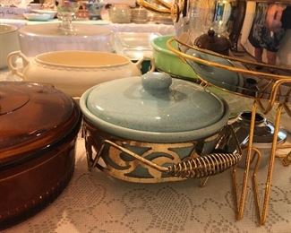 Pottery crock with brass stand