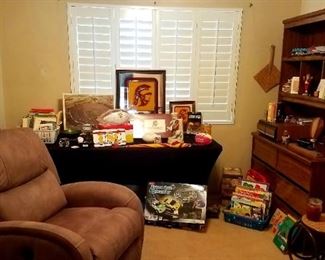 USC University of Southern California memorabilia.  Children's games and toys (for grandma and grandpa's house).  Books.  Mounted train cars.  Decor 