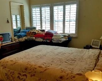 Queen size bed, blankets and comforters.  