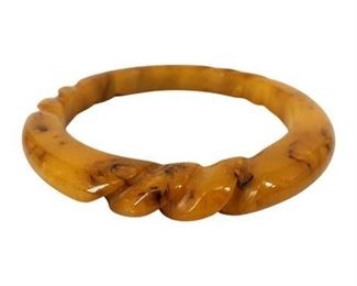 Lot 396
Carved Yellow Swirl Bakelite Bangle Bracelet