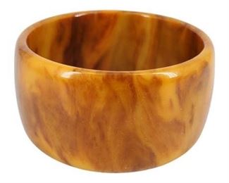 Lot 402
Wide Butterscotch Swirl Bakelite Bangle Bracelet