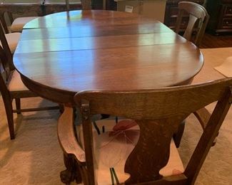 Antique ball and claw oak table with 4 chairs. 