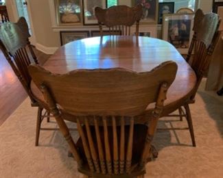 Antique ball and claw oak table with 4 chairs. 