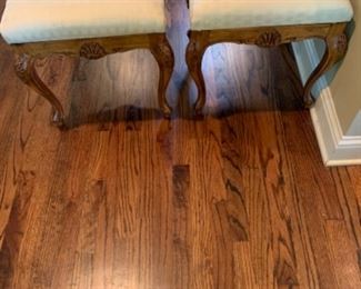 Pair of ivory upholstered footstools. 
