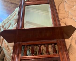 Antique mirrored shelf. 
