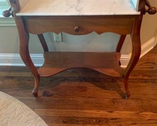 Small marble top buffet/sideboard. 