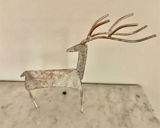 $30 Metal folk art deer.  9" W, 8" H. 